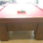 Brunswick Medalist pool table with the balls racked and ready for play