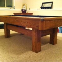 Corner side view of a Brunswick Highlander pool table