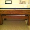 Side view of a used Brunswick Highlander pool table