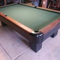 Sportsman pool table from the Brunswick-Balke-Collender company. A true antique classic pool table that will continue to be a prized piece for centuries to come.