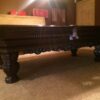 Beautiful side view of a Comwell pool table.
