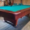 Corner view of a Brunswick Gold Crown 4 pool table in an eight foot pro size.