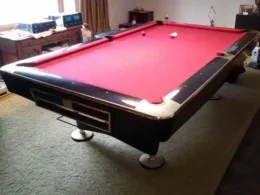 Used Brunswick Gold Crown IV in piano black pool table for sale