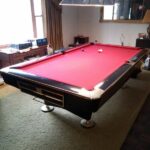 Used Brunswick Gold Crown IV in piano black pool table for sale