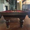 Kasson Stratford table with pool balls on it.