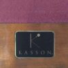 Kasson logo on rail of pool table.