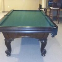 End and legs of Olhausen Santa Ana pool table.