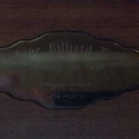 Proline logo plate on this pool table rail.