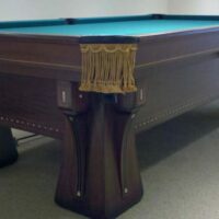 Closeup of the legs on this Brunswick Balke Collender Arcade pool table from the 1920's Circa line.