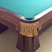 Corner pocket on Brunswick Arcade pool table.