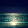 Brunswick Balke Collender logo from an antique Paragon 6 leg table.