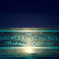 Brunswick Balke Collender logo from an antique Paragon 6 leg table.