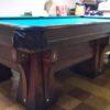 Brunswick-Balke-Collender Arcade pool table with 6 legs.