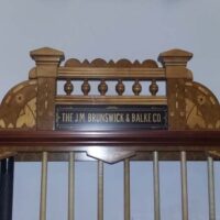 closeup of the plaque name for the brunswick exposition rack