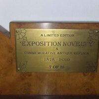 Limited edition Exposition novelty metal plate on the cue rack showing it was made by Brunswick.