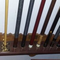 base view of the Brunswick Novelty Exposition cue rack.