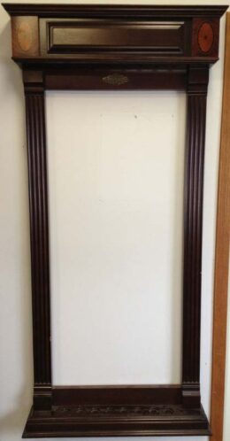 Windsor cue rack from Brunswick billiards shown on our wall.
