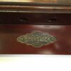 Brunswick plaque on the windsor cue rack.