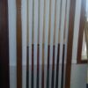 Beautiful solid wood wall mounted cue rack from Brunswick Billiards.