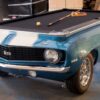 1969 Car Pool Table in blue with white racing stripe, setup and ready for play.