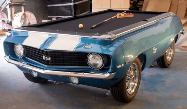 1969 Car Pool Table in blue with white racing stripe, setup and ready for play.