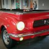 Front end view with working headlights of a 1965 collectors edition Ford Mustang pool table from Car Pool Tables.