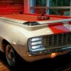really cool 1969 Chevy Camaro car pool table in white with red cloth and red racing stripes.
