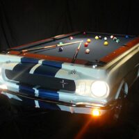 ford shelby car pool table with headlights lit.