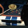 Shelby leaning on his replica GT 350 pool table.