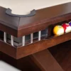 The Wilson pool table ball containment system built into the rails of the pool table, very cool!